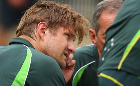 Shane Watson of Australia is seen to by the club doctor after being hit in the helmet whilst batting in the nets during an Australian training session at Melbourne Cricket Ground on December 23, 2014 in Melbourne, Australia. (Getty)