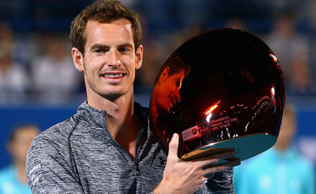 Andy Murray of Great Britain poses with the trophy after winning the the Mubadala World Tennis Championship at Zayed Sport City on January 3, 2015 in Abu Dhabi, United Arab Emirates. (Getty)