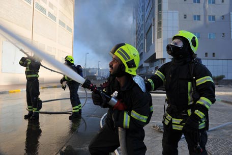 Firefighters battling the blaze in Abu Dhabi on Tuesday evening. (Supplied)