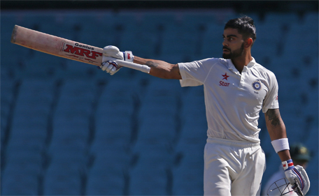 India's captain Virat Kohli celebrates reaching his century during the third day's play in the fourth Test against Australia at the Sydney Cricket Ground (SCG) January 8, 2015. (Reuters)