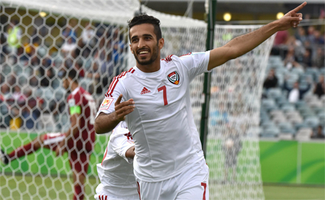 Ali Ahmed Mabkhout  of UAE reacts after scoring  during their Group C Asian Cup football match between UAE and Qatar in Canberra on January 11, 2015. (AFP)