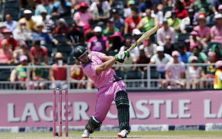 South Africa's captain AB de Villiers hits a delivery during the second one-day international against the West Indies at the Wanderers Stadium in Johannesburg January 18, 2015. (Reuters)