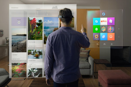 A model wears the Microsoft HoloLens as he scrolls through a virtual Windows menu in this publicity photo released to Reuters January 21, 2015.  (AFP)
