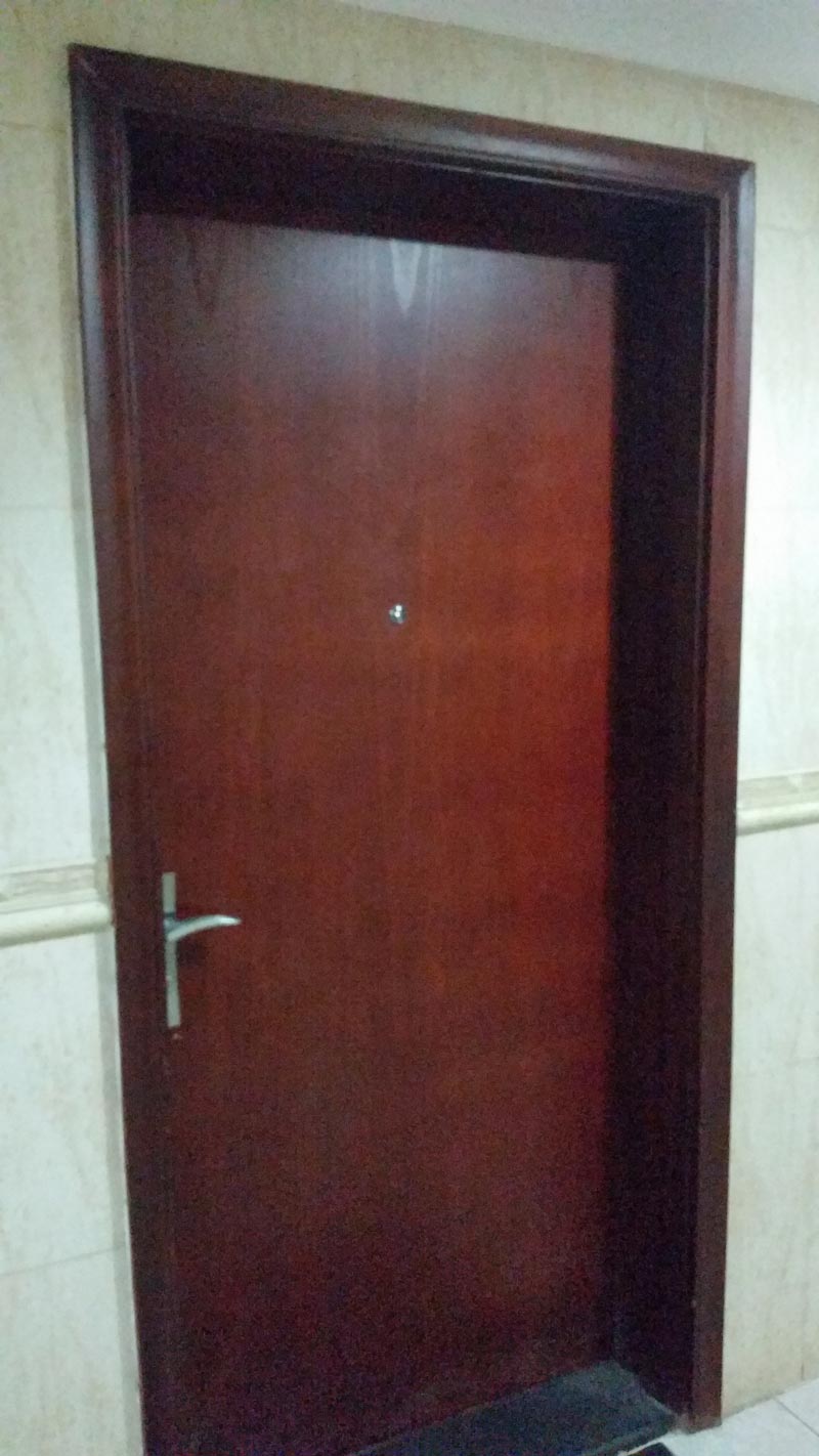The door of the dead man's apartment in a high-rise building in Dubai's Tecom area.