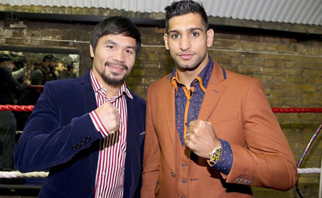 Manny Pacquiao (left) and Amir Khan square up following their get-together at the Fitzroy Lodge boxing club in London. (Photo courtesy Facebook)