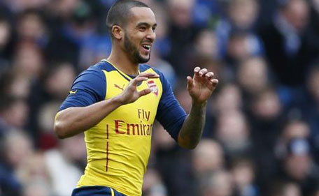 Arsenal's Theo Walcott celebrates after scoring a goal against Brighton and Hove Albion during their FA Cup fourth round soccer match at the Amex stadium in Brighton, southern England January 25, 2015. (Reuters)