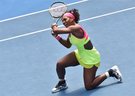 Serena Williams of the US hits a return against Garbine Muguruza of Spain in their women's singles match on day eight of the 2015 Australian Open tennis tournament in Melbourne on January 26, 2015. (AFP)