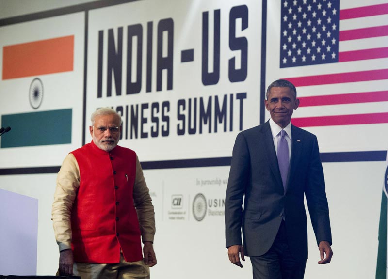 Indian Prime Minister Narendra Modi (L) and US President Barack Obama leave after speaking at the India-US Business Summit in New Delhi on January 26, 2015. (AFP)