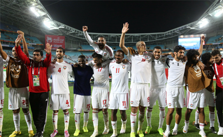 A file picture taken on January 23, 2015 shows the United Arab Emirates team waving to their fans after winning the quarter-final against Japan at the AFC Asian Cup in Sydney. (AFP)