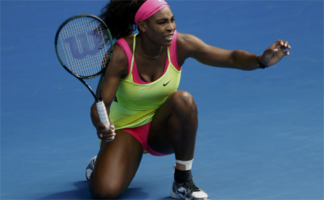 Serena Williams of the US reacts after hitting a return to compatriot Madison Keys during their women's singles semi-final match at the Australian Open 2015 tennis tournament in Melbourne January 29, 2015. (Reuters)