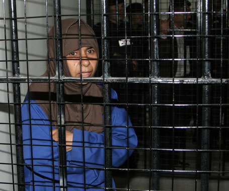 Iraqi Sajida Al Rishawi, 35, stands inside a military court at Juwaida prison in Amman in this April 24, 2006 file photo.