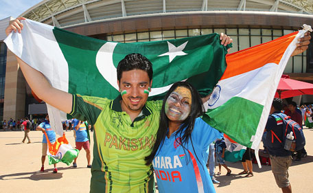 Pakistan and India supporters pose with their flags outside of the ground during the 2015 ICC Cricket World Cup match between India and Pakistan at the Adelaide Oval on February 15, 2015 in Adelaide, Australia. (Getty Images)