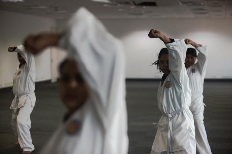 Policewomen take part in a self-defence class in New Delhi. (AFP)