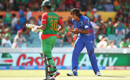 Shapoor Zadran of Afghanistan celebrates dismissing Soumya Sarkar of Bangladesh during the 2015 ICC Cricket World Cup match between Bangladesh and Afghanistan at Manuka Oval on February 18, 2015 in Canberra, Australia. (Getty Images)