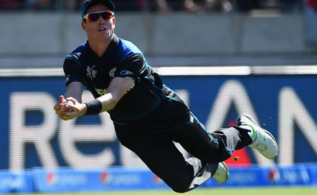 Adam Milne of New Zealand catches England captain Eoin Morgan during the 2015 ICC Cricket World Cup match between England and New Zealand at Wellington Regional Stadium on February 20, 2015 in Wellington, New Zealand. (Getty)