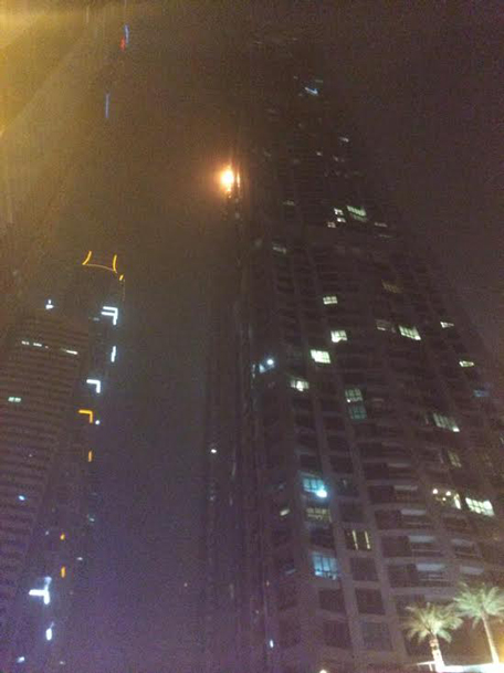 Fire that broke out at about 2am in the 86-storey Torch tower. (Supplied)