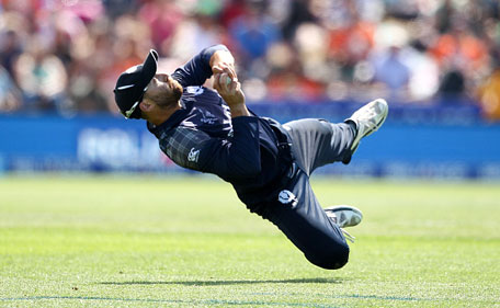 Preston Mommsen of Scotland holds a catch to dismiss Chris Woakes of England during the 2015 ICC Cricket World Cup match between England and Scotland at Hagley Oval on February 23, 2015 in Christchurch, New Zealand. (Getty Images)