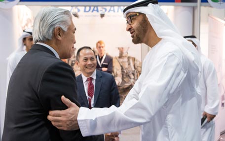 Gen. Sheikh Mohamed bin Zayed greets Dr Ng Eng Hen, Defence Minister of Singapore, during his tour of the Singapore Tech Kinetics stall at the 2015 International Defence Exhibition and Conference (Idex) at the Abu Dhabi National Exhibition Centre (Adnec) on Monday. (Wam)