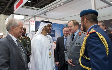 Gen. Sheikh Mohamed bin Zayed Al Nahyan speaks with members of the German delegation during his tour of the German pavilion at the 2015 International Defence Exhibition and Conference (Idex) at Abu Dhabi National Exhibition Centre (Adnec) on Monday. (Wam)