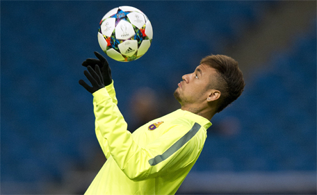 Barcelona's Brazilian forward Neymar da Silva Santos Junior takes part in a team training session at the Etihad Stadium in Manchester, England on February 23, 2015, ahead of their UEFA Champions League last 16 football match against Manchester City in Manchester on February 24, 2015. (AFP)