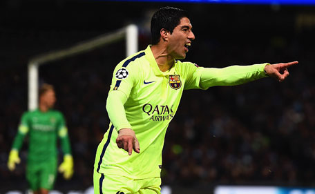 Luis Suarez of Barcelona celebrates scoring their second goal during the UEFA Champions League Round of 16 match between Manchester City and Barcelona at Etihad Stadium on February 24, 2015 in Manchester, United Kingdom. (Getty)