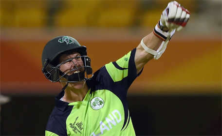 Ireland batsman George Dockrell celebrates after scoring the winning runs during the 2015 Cricket World Cup Pool B match between Ireland and UAE at the Gabba in Brisbane on February 25, 2015. (AFP)