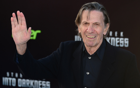 Leonard Nimoy, who played the role of Spock in the original Star Trek television series, waves on arrival for the Los Angeles premiere of the movie 'Star Trek Into Darkness" in Hollywood, California, in this May 14, 2013, file photo. Nimoy, who won a worldwide fan base as the pointy-eared half-human, half-Vulcan Mr Spock in the blockbuster "Star Trek" television and film franchise, died Friday at age 83, US media reported. His wife, Susan Bay Nimoy, confirmed the death to the New York Times. Nimoy had been suffering from chronic obstructive pulmonary disease.  (AFP)