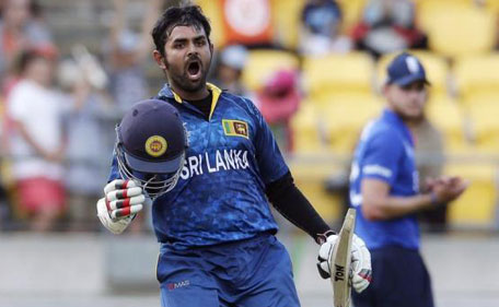 Sri Lanka's Lahiru Thirimanne celebrates reaching his century during their Cricket World Cup match against England in Wellington, March 1, 2015. (Reuters)