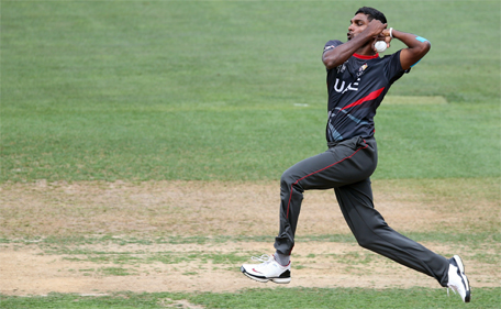 UAE cricketer Manjula Guruge bowls during the Pool B Cricket World Cup match between the UAE and Pakistan at McLean Park in Napier on March 4, 2015. (AFP)