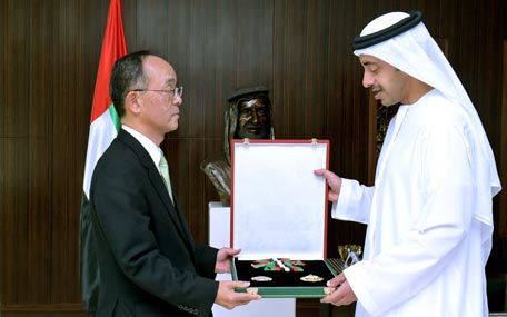 Sheikh Abdullah bin Zayed Al Nahyan presenting Japanese Ambassador Kamo with the medal on Wednesday. (Wam)