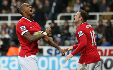 Manchester United's midfielder Ashley Young celebrates scoring the opening goal of the English Premier League football match between Newcastle and Manchester United at St James Park, Newcastle-Upon-Tyne, England on March 4, 2015. (AFP)