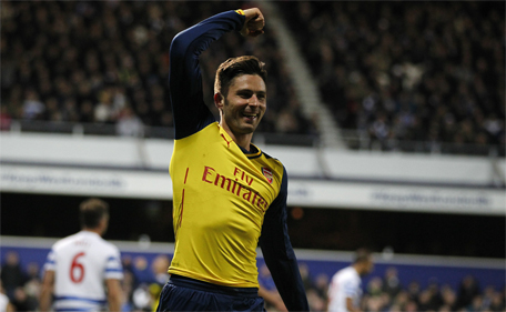 Arsenal striker Olivier Giroud celebrates scoring the opening goal during the English Premier League football match between Queen's Park Rangers and Arsenal at Loftus Road Stadium in London on March 4, 2015. (AFP)