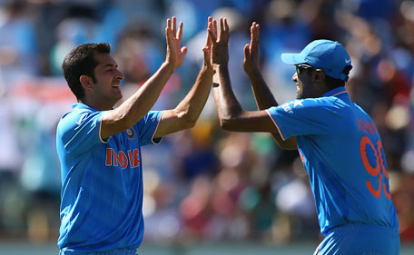 Mohit Sharma and Ravichandran Ashwin of India celebrate the dismissal of Chris Gayle of the West Indies during the 2015 ICC Cricket World Cup match between India and the West Indies at WACA on March 6, 2015 in Perth, Australia. (Getty)