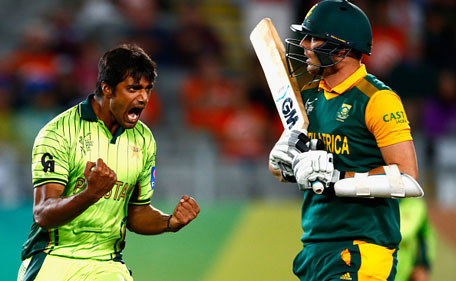 Rahat Ali of Pakistan celebrates his wicket of Kyle Abbott (right) of South Africa  during the 2015 ICC Cricket World Cup match between South Africa and Pakistan at Eden Park on March 7, 2015 in Auckland, New Zealand. (Getty Images)