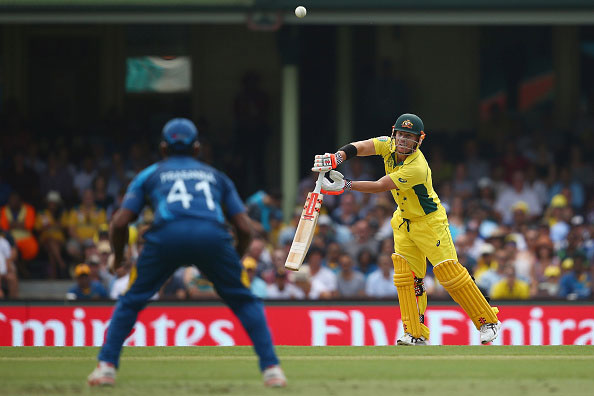 David Warner of Australia watches on as he is about to be caught by Seekuge Prasanna of Sri Lanka during the 2015 ICC Cricket World Cup match between Australia and Sri Lanka at Sydney Cricket Ground on March 8, 2015 in Sydney, Australia. (Getty)