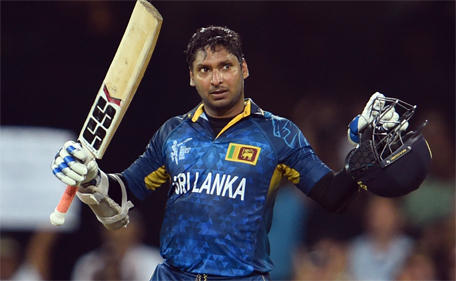 Sri Lanka batsman Kumar Sangakkara celebrates scoring his century against Australia during their 2015 Cricket World Cup Group A match in Sydney on March 8, 2015. (AFP)