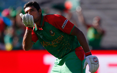 Bangladesh batsman Mohammad Mahmudullah blows a kiss to the crowd after scoring his nation's first ever century in a world cup during their Cricket World Cup match against England in Adelaide, March 9, 2015. (REUTERS)