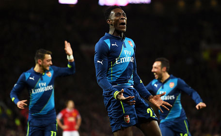 Danny Welbeck of Arsenal celebrates after scoring his team's second goal during the FA Cup Quarter Final match between Manchester United and Arsenal at Old Trafford on March 9, 2015 in Manchester, England. (Getty)