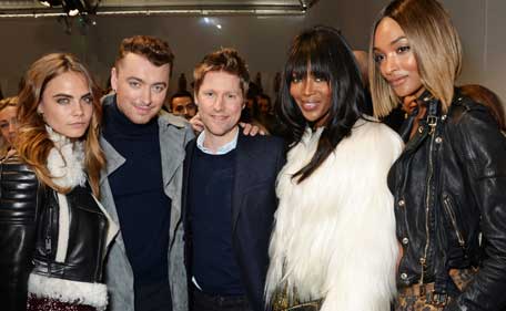 (L to R) Cara Delevingne, Sam Smith, Christopher Bailey, Naomi Campbell and Jourdan Dunn pose backstage at the Burberry Prorsum AW 2015 Backstage during London Fashion Week at Kensington Gardens on February 23, 2015 in London, England. (Getty)