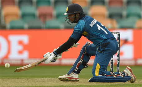 Sri Lanka batsman Kumar Sangakkara plays a shot at the Bellerive Oval ground during the 2015 Cricket World Cup Pool A match between Scotland and Sri Lanka in Hobart on March 11, 2015.  (AFP)