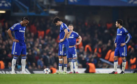 Chelsea v Paris St Germain - UEFA Champions League Second Round Second Leg - Stamford Bridge, London, England - 11/3/15: Chelsea's Didier Drogba (left), Diego Costa and Cesc Fabregas (right) look dejected after Thiago Silva (not pictured) scored the second goal for PSG. (Action Images via Reuters)