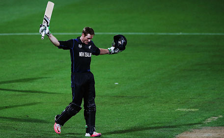 Martin Guptill of New Zealand celebrates after scoring a century during the 2015 ICC Cricket World Cup match between Bangladesh and New Zealand at Seddon Park on March 13, 2015 in Hamilton, New Zealand. (Getty)
