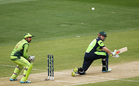 William Porterfield of Ireland bats in front of Sarfaraz Ahmed of Pakistan during the 2015 ICC Cricket World Cup match between Pakistan and Ireland at Adelaide Oval on March 15, 2015 in Adelaide, Australia. (Getty Images)