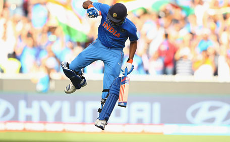 Rohit Sharma of India celebrates after scoring his century during the 2015 ICC Cricket World Cup match between India and Bangldesh at Melbourne Cricket Ground on March 19, 2015 in Melbourne, Australia. (Getty)