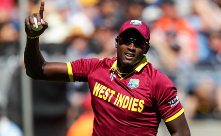 Jason Holder of the West Indies celebrates after taking a catch to dismiss Brendon McCullum of New Zealand during the 2015 ICC Cricket World Cup match between New Zealand and the West Indies at Wellington Regional Stadium on March 21, 2015 in Wellington, New Zealand. (Getty Images)