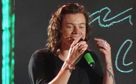 One Direction band member Harry Styles performs during a concert. (Bang)