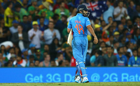 Virat Kohli of India looks back to the pitch after being dismissed by Mitchell Johnson of Australia during the 2015 Cricket World Cup Semi Final match between Australia and India at Sydney Cricket Ground on March 26, 2015 in Sydney, Australia. (Getty Images)