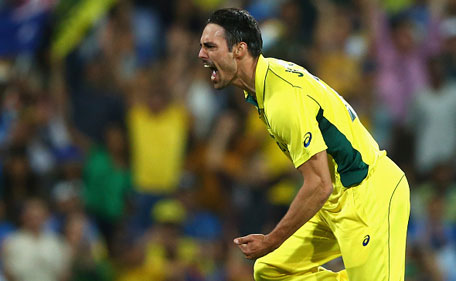 Mitchell Johnson of Australia celebrates after taking the wicket of Virat Kohli of India during the 2015 Cricket World Cup Semi Final match between Australia and India at Sydney Cricket Ground on March 26, 2015 in Sydney, Australia. (Getty Images)