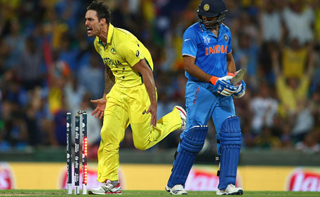 Mitchell Johnson of Australia celebrates after taking the wicket of Rohit Sharma of India during the 2015 Cricket World Cup Semi Final match between Australia and India at Sydney Cricket Ground on March 26, 2015 in Sydney, Australia. (Getty Images)