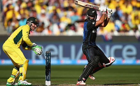 Grant Elliott of New Zealand bats as Brad Haddin of Australia keeps wicket during the 2015 ICC Cricket World Cup final match between Australia and New Zealand at Melbourne Cricket Ground on March 29, 2015 in Melbourne, Australia. (Getty)